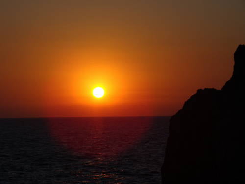 Pôr do sol no beach club Lido del Faro